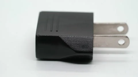 Electrical plug. Adapter from European plug to American or Chinese for travel. Vidéo 169369265