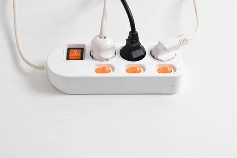 Electrical plug in outlet socket at home isolated on white background, Outlet Stock Photos