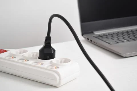 Electrical plug in outlet socket at home. Outlet, Electric Plug Foto stock