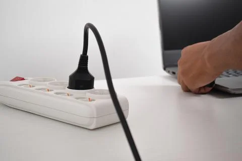 Electrical plug in outlet socket at home. Outlet, Electric Plug Stock Photos