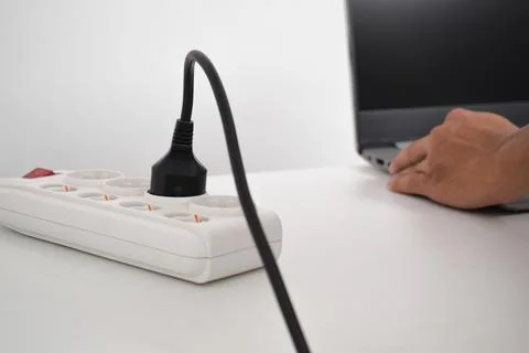 Electrical plug in outlet socket at home. Outlet, Electric Plug Stock Photos