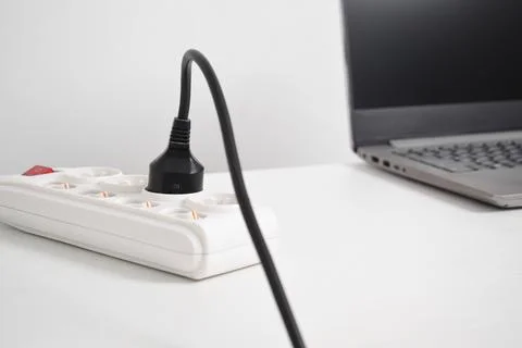 Electrical plug in outlet socket at home. Outlet, Electric Plug Stock Photos