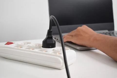 Electrical plug in outlet socket at home. Outlet, Electric Plug Stock Photos