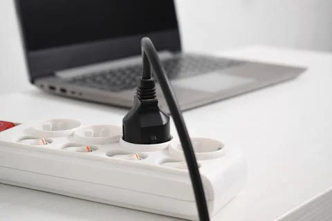 Electrical plug in outlet socket at home. Outlet, Electric Plug Stock Photos