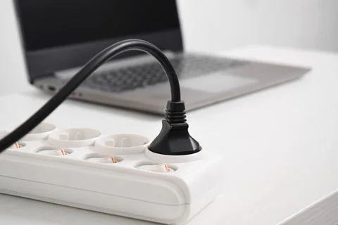 Electrical plug in outlet socket at home. Outlet, Electric Plug, Power Cable, Stock Photos