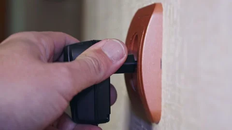 Electrical plug is thrust into the outlet Stock Footage 103407166