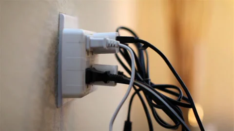 Electrical Plugs Plugged Into Wall Stock Footage 39196535