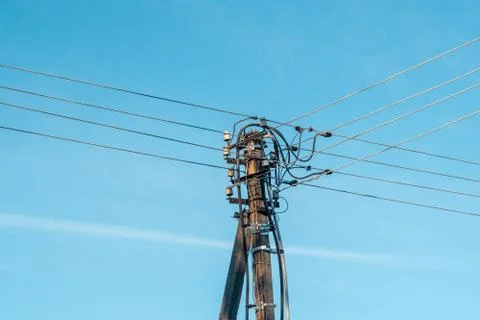 Electrical pole and cables Stock Photos