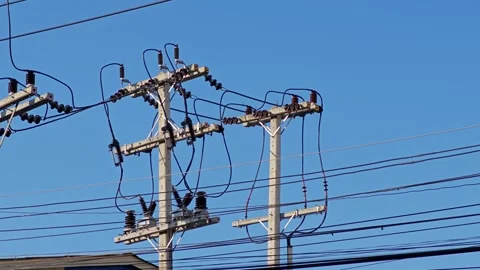 An electrical pole or utility pole under the blue sky, Energy or power. Stock Footage 304437064