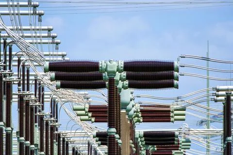 Electrical power grid substation switchgear and insulators close up Stock Photos