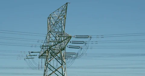 Electrical power lines and utility tower American electrical grid infrastructure Stock Footage 74676073