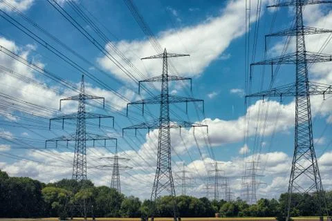 Electrical power lines sky cloud in background Stock Photos