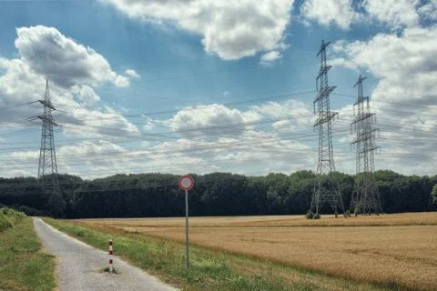 Electrical power lines sky cloud in background blue nature strong Stock-Fotos
