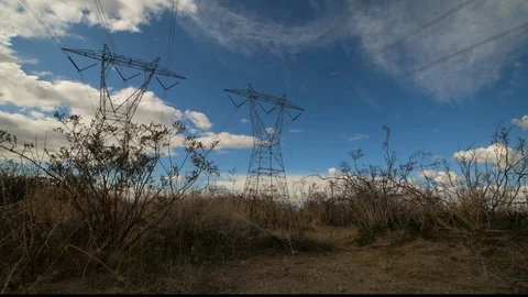 Electrical power lines through Antelope Valley in Jojave Desert Stock Footage 131344890