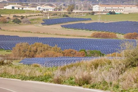 Electrical power plant with rows of solar panels for producing clean ecolog.. Stock Photos