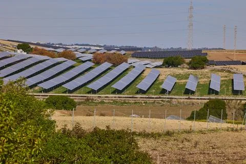 Electrical power plant with rows of solar panels for producing clean ecolog.. Stock Photos