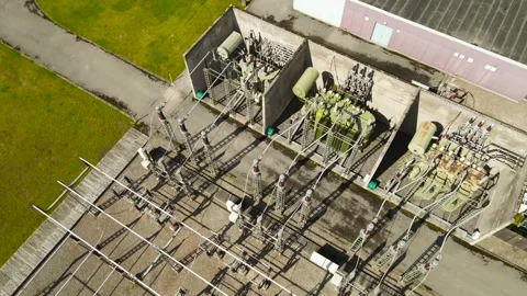 Electrical power substation with high voltage transformers aerial view Stock Footage 337408685