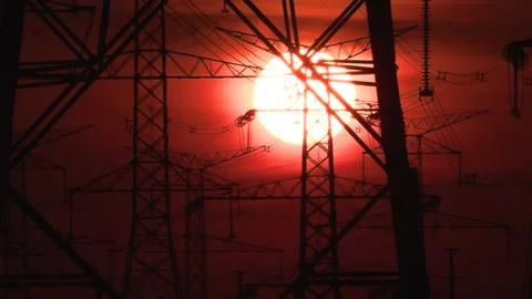 Electrical power transmission grid with red sunset and power lines Vídeo Stock 149384818