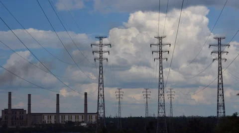 Electrical pylons with clouds Stock Footage 64750638