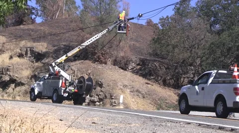 Electrical repair work being done in the foothills on a hot summer day Video stock 54099807
