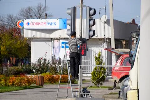 Electrical repairs traffic light at the intersection. Broken tra Stock Photos