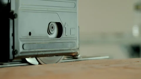 Electrical saw, electric power carpentry tools. Process of cutting plywood on Stock Footage 310630838
