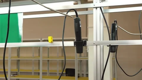 An electrical screwdriver at the computer assembly master's workplace Stock-Footage 153018479