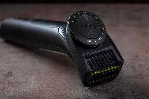 Electrical shaver on a dark background Stock Photos