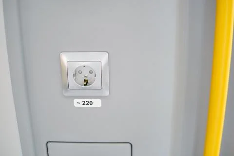 Electrical socket 220 volts for charging a phone as an interior detail of p.. Stock Photos
