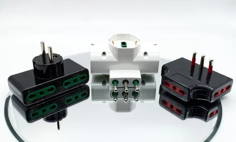Electrical socket adaptors. Connecting devices to home power Stock Photos