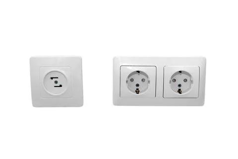 Electrical socket and power outlet on isolated white background. Household wa Stock Photos