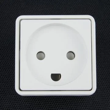 Electrical socket on black background Stock Photos