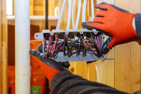 Electrical socket boxes inside frame house with basic electrical wiring 스톡 사진