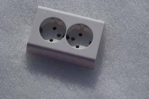Electrical socket on the snow close-up. Stock Photos
