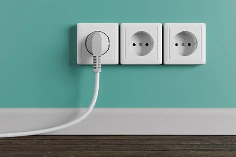 An electrical socket in the wall in the apartment of the house. Stock Photos