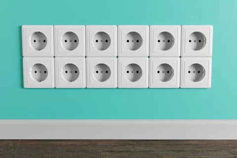 An electrical socket in the wall in the apartment of the house. Stock Photos
