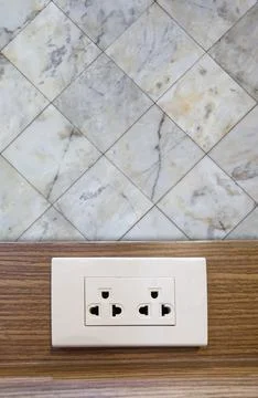 Electrical socket on the walls in the house, object background Fotos de archivo