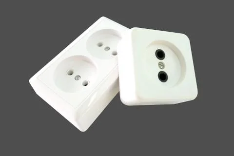Electrical sockets on a grey background Foto stock