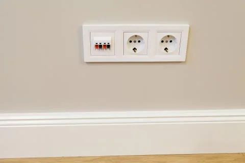 Electrical sockets with a switch on wall Stock Photos