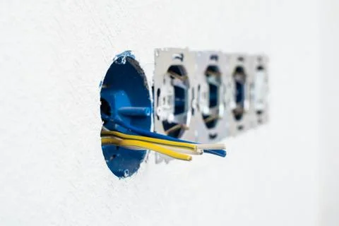 Electrical sockets in a white wall Stock Photos