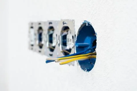 Electrical sockets in a white wall Stock Photos