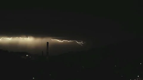Electrical storm with lightning series over the tropical mountain coast durin Video stock 64658498