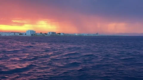 Electrical Storm with Lightning Strike over Mediterranean Sea at Sunset in Stock Footage 337161362