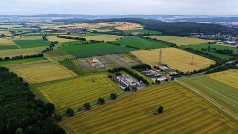 Electrical Substation and Power Grid in Agricultural Landscape From Above Stock Photos