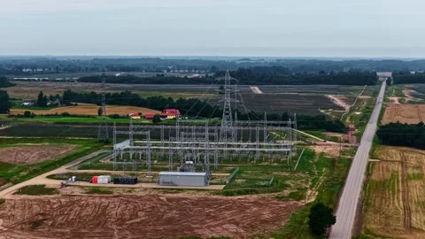 Electrical Substation and Transmission Tower Aerial View near Farmland Stock Footage 341546004