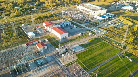 Electrical substation connecting large data center at sunset Stockfoto's