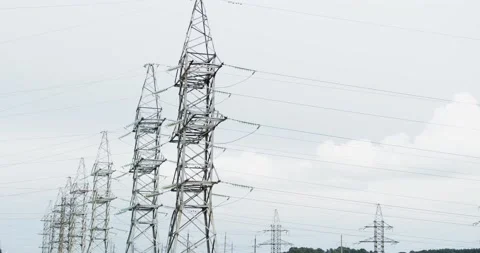 Electrical substation - grid of high voltage power lines and wires. Long-range Stock Footage 151336538