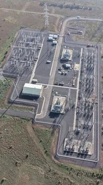 Electrical substation maintaining power grid infrastructure delivering energy Stock Photos
