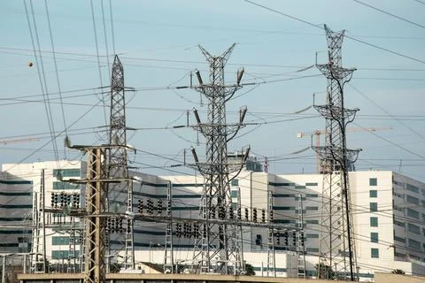 Electrical substation with many metal structures. Management, distribution of Stock Photos