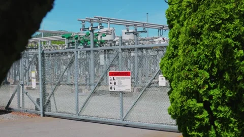 Electrical substation security sliding gate with warning safety sign Stock Footage 340233781
